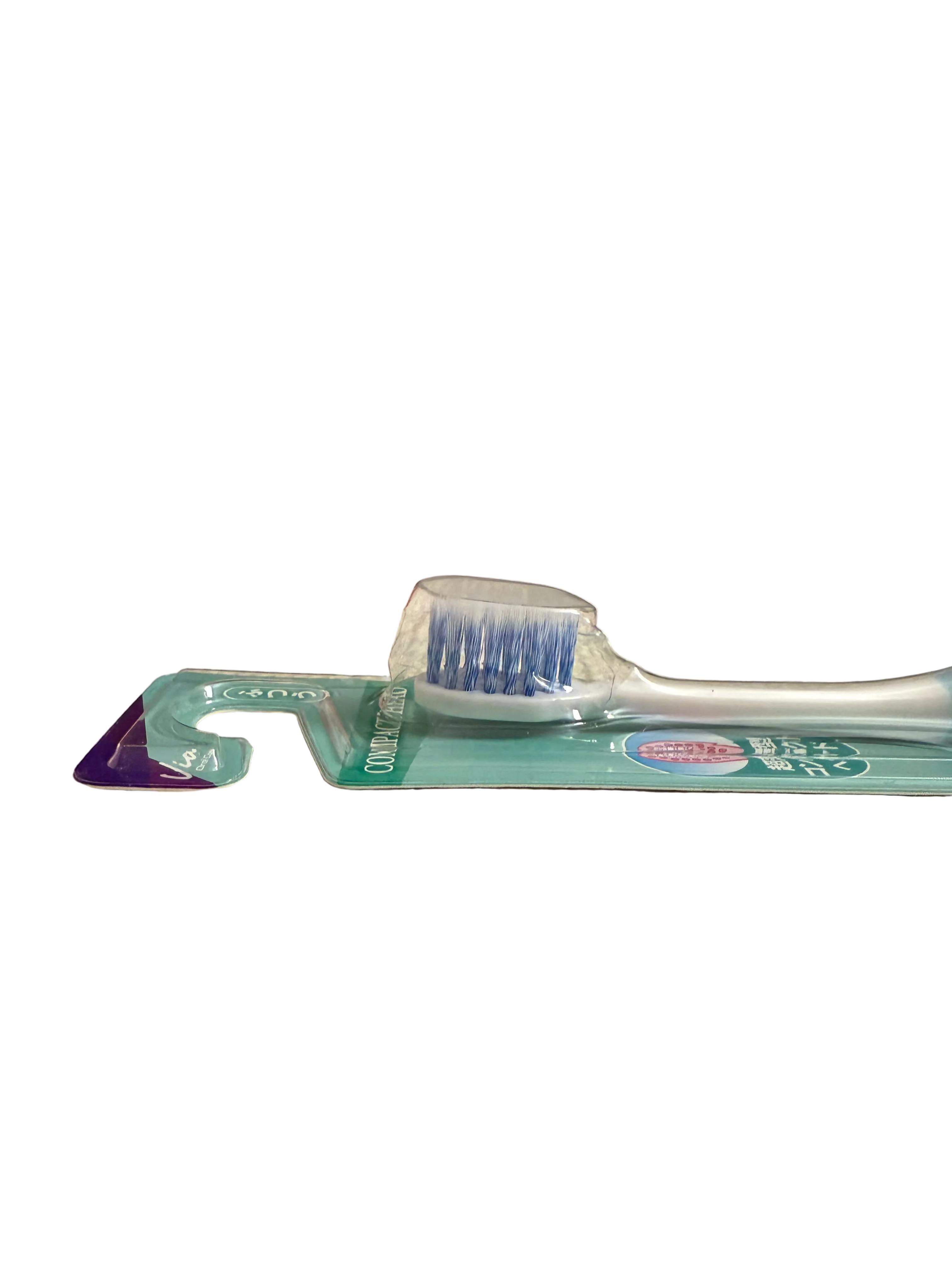 Toothbrush bristle with packaging on a white surface