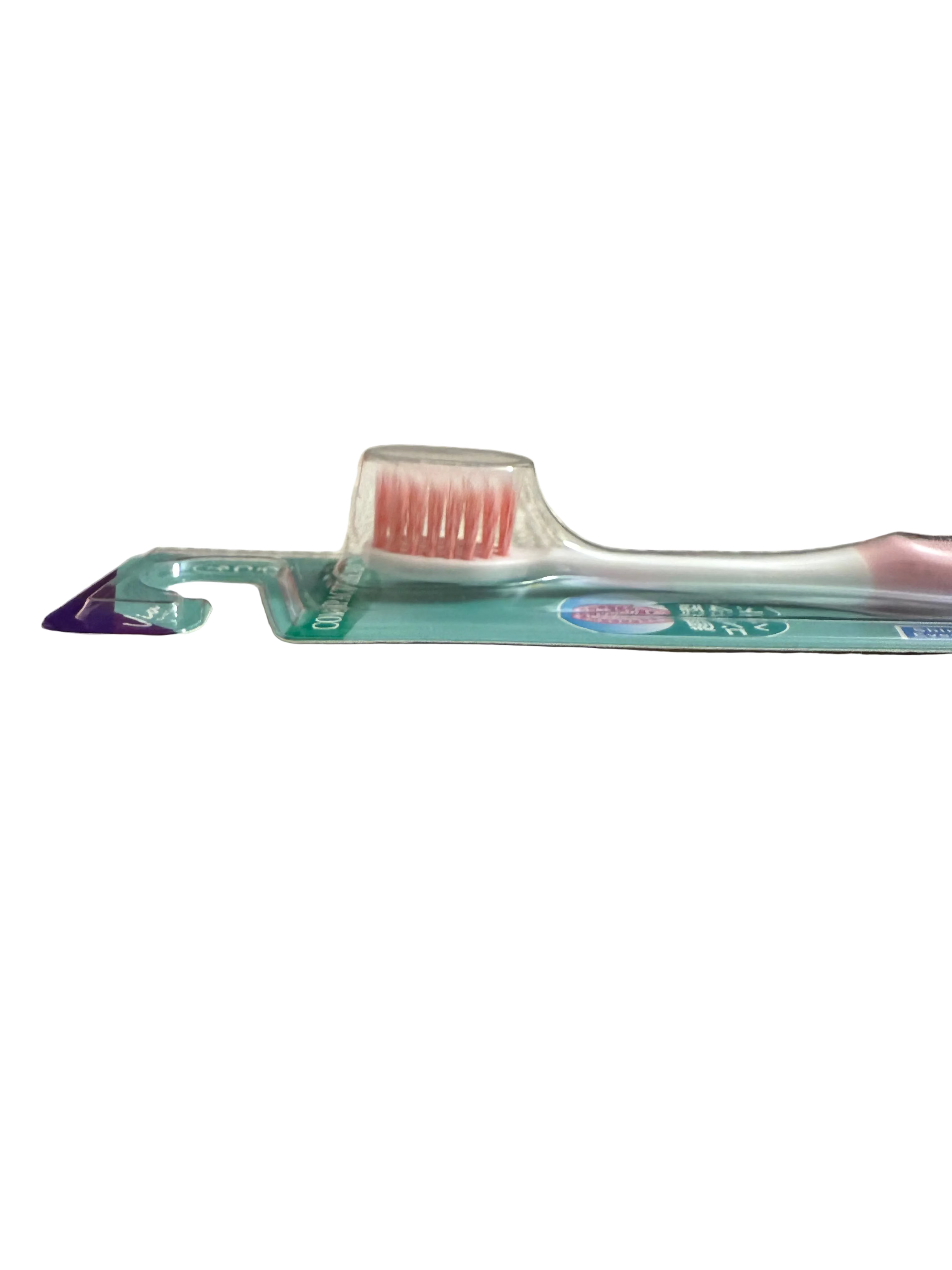 Toothbrush bristle with packaging on a white surface