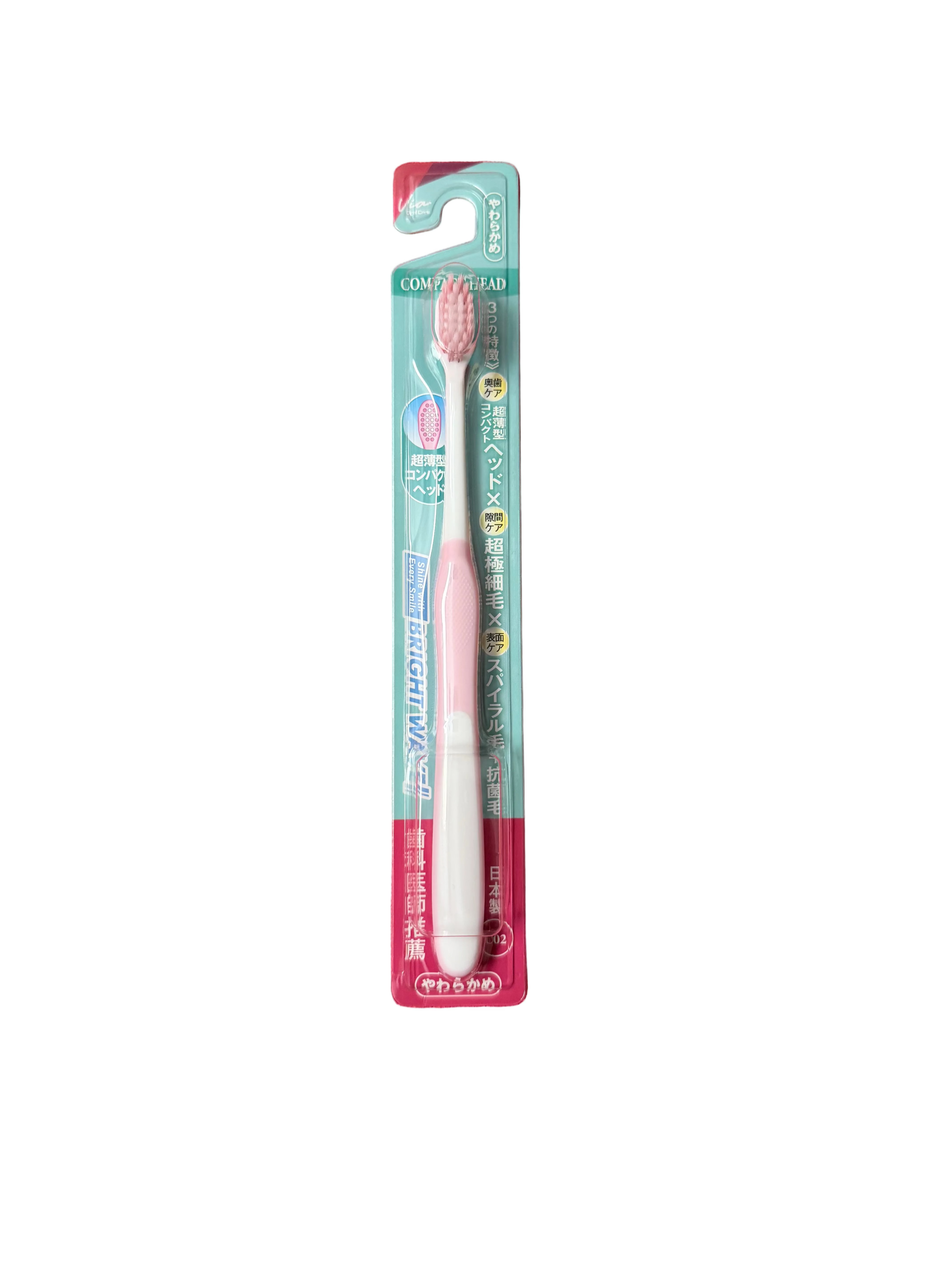 Pink toothbrush with packaging on a white background
